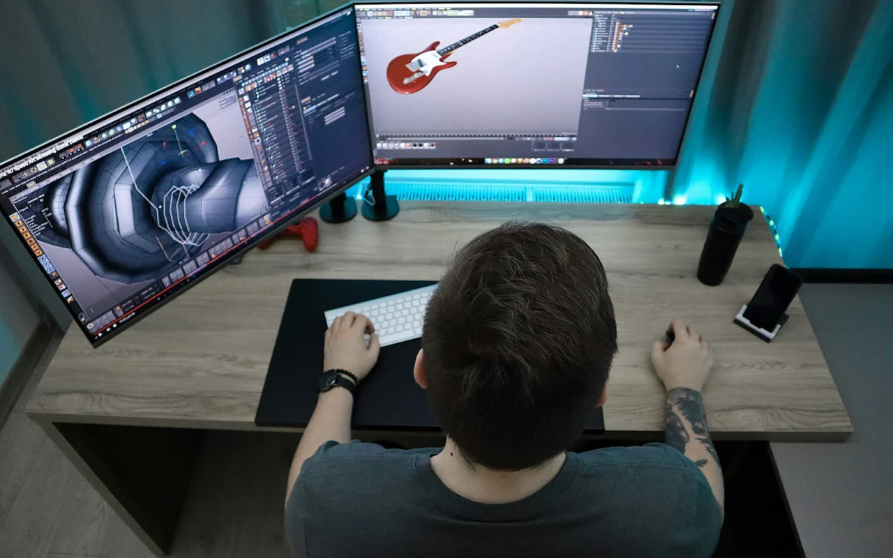Designer working on motion graphics at a computer