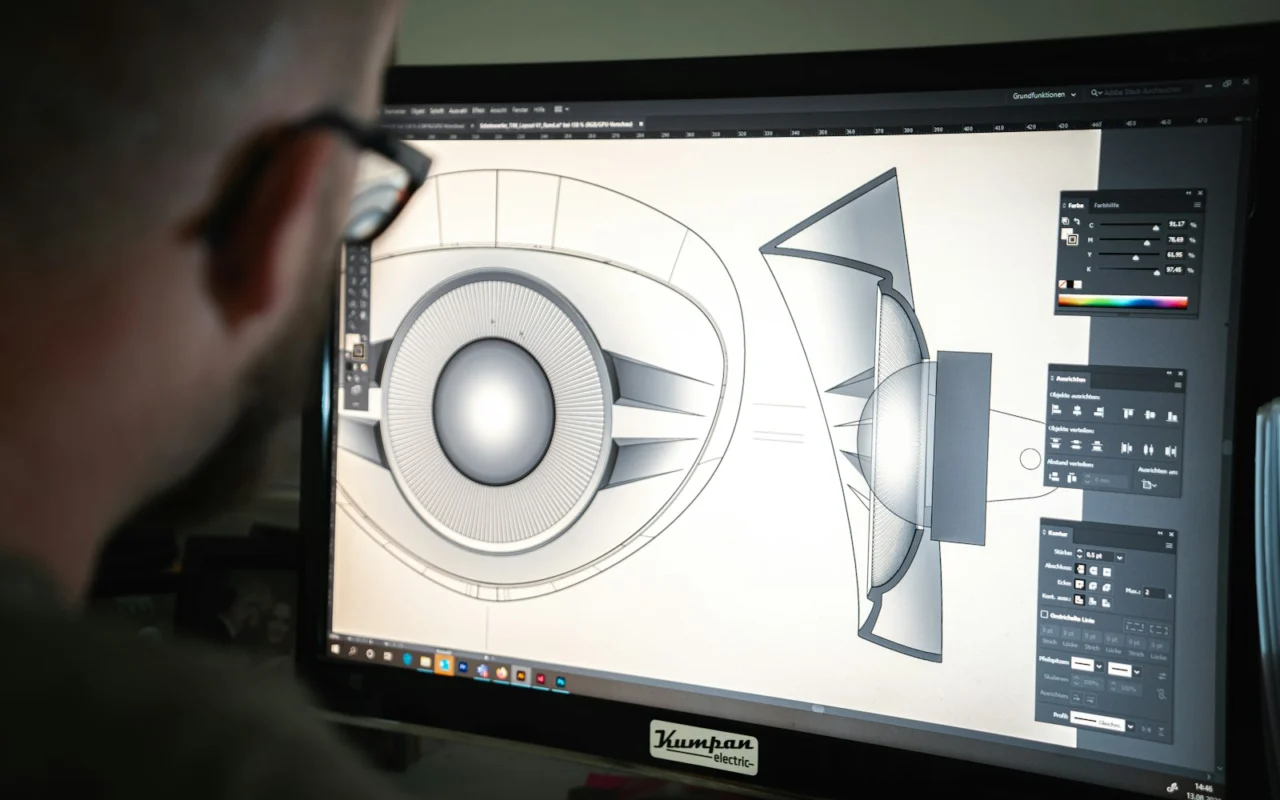 Product designer reviewing concepts on screen