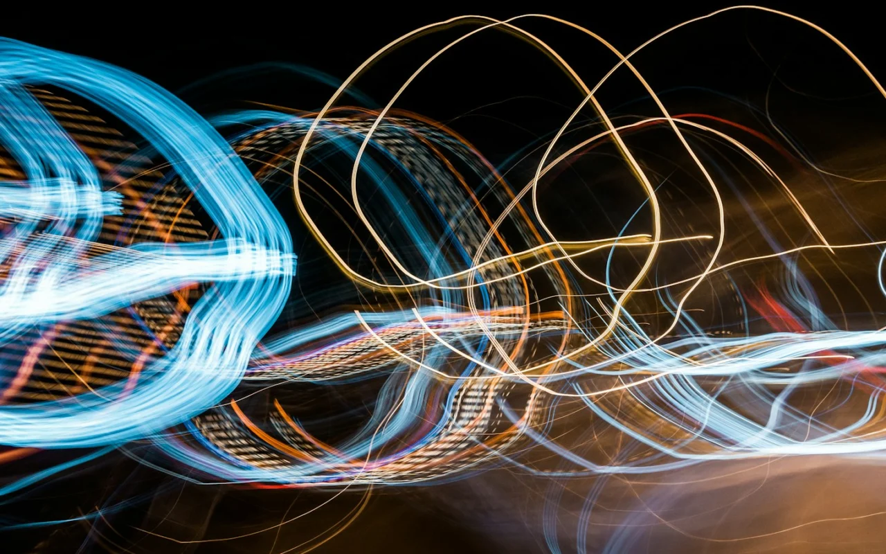 Blue and white light trails in motion